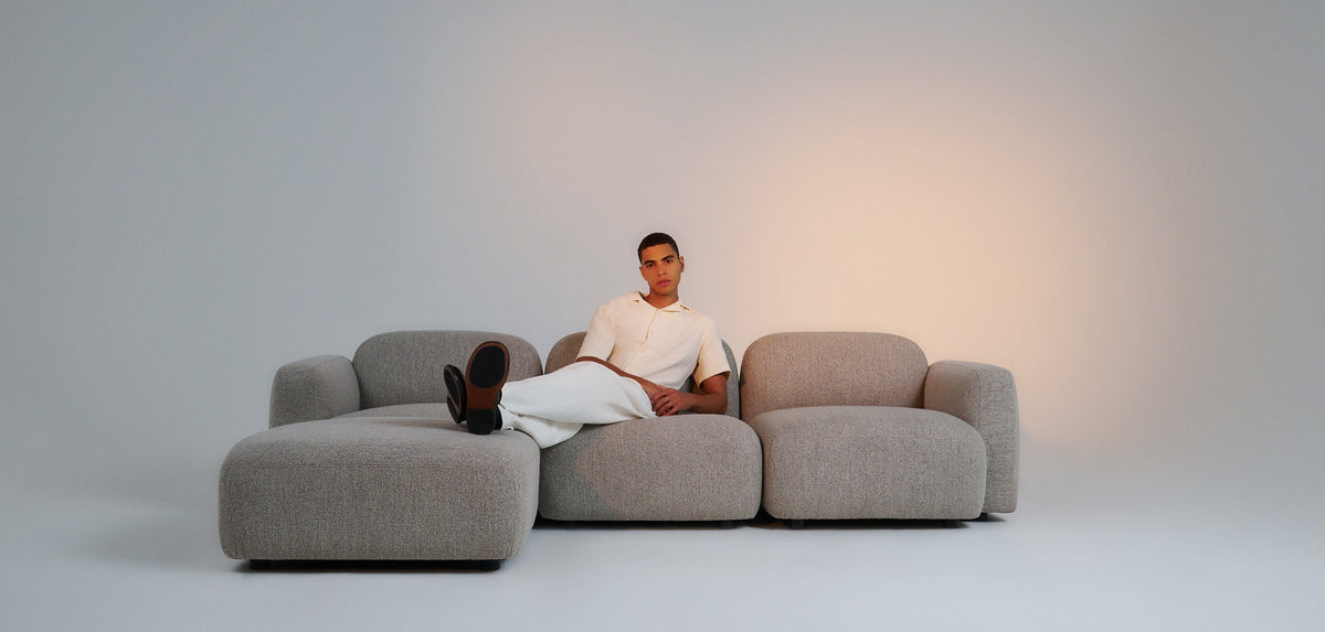 A man relaxing on a Sofa Club modular sofa